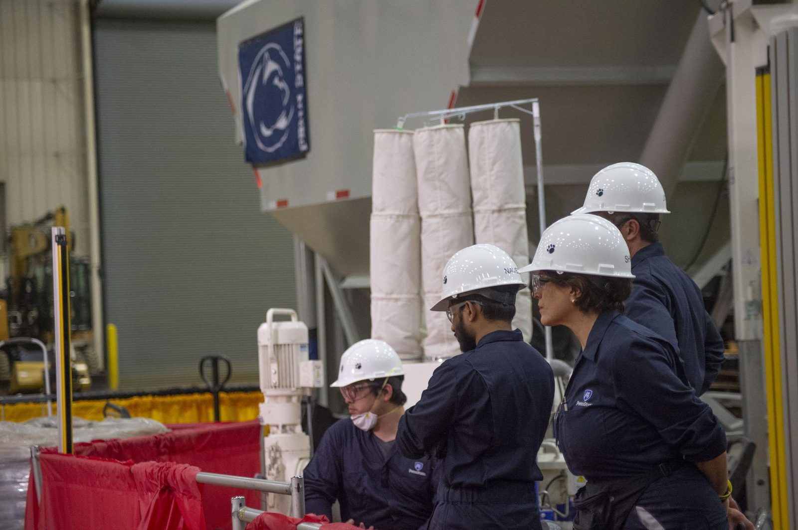 Someone working in 3D Printing — Ellis Abel Learns Members of the Penn State team prepare their gantry 3D printer before starting a habitat print at the NASA 3D-Printed Habitat Challenge. Real NASA photograph used on the Ellis Abel Learns "Why I Love 3D Printing" page.