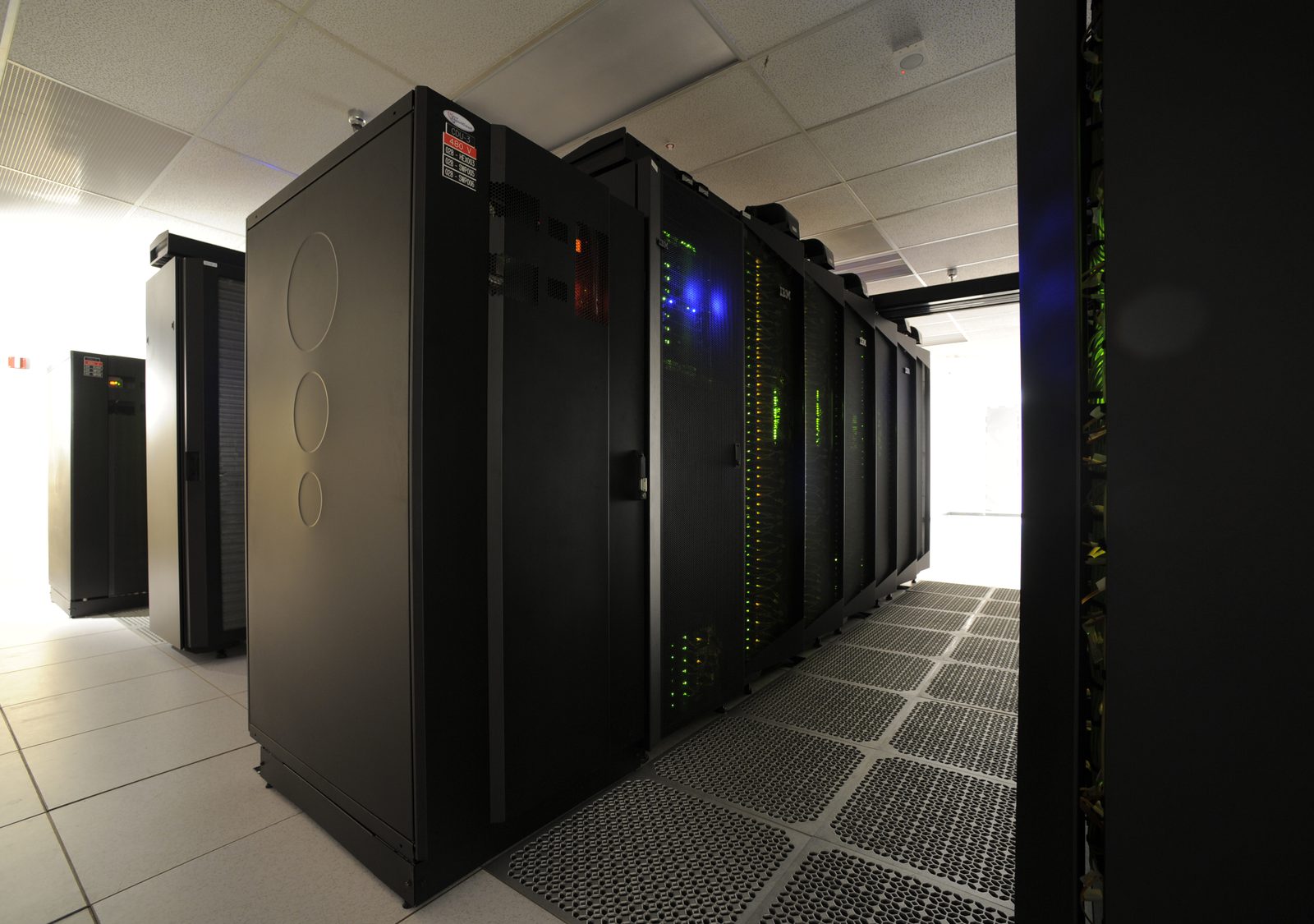 A close-up of one row of the Discover supercomputer, showing about 2,000 processors stacked in cabinets with cabling. Real NASA photograph used on the Ellis Abel Learns "Why I Love Data" page.