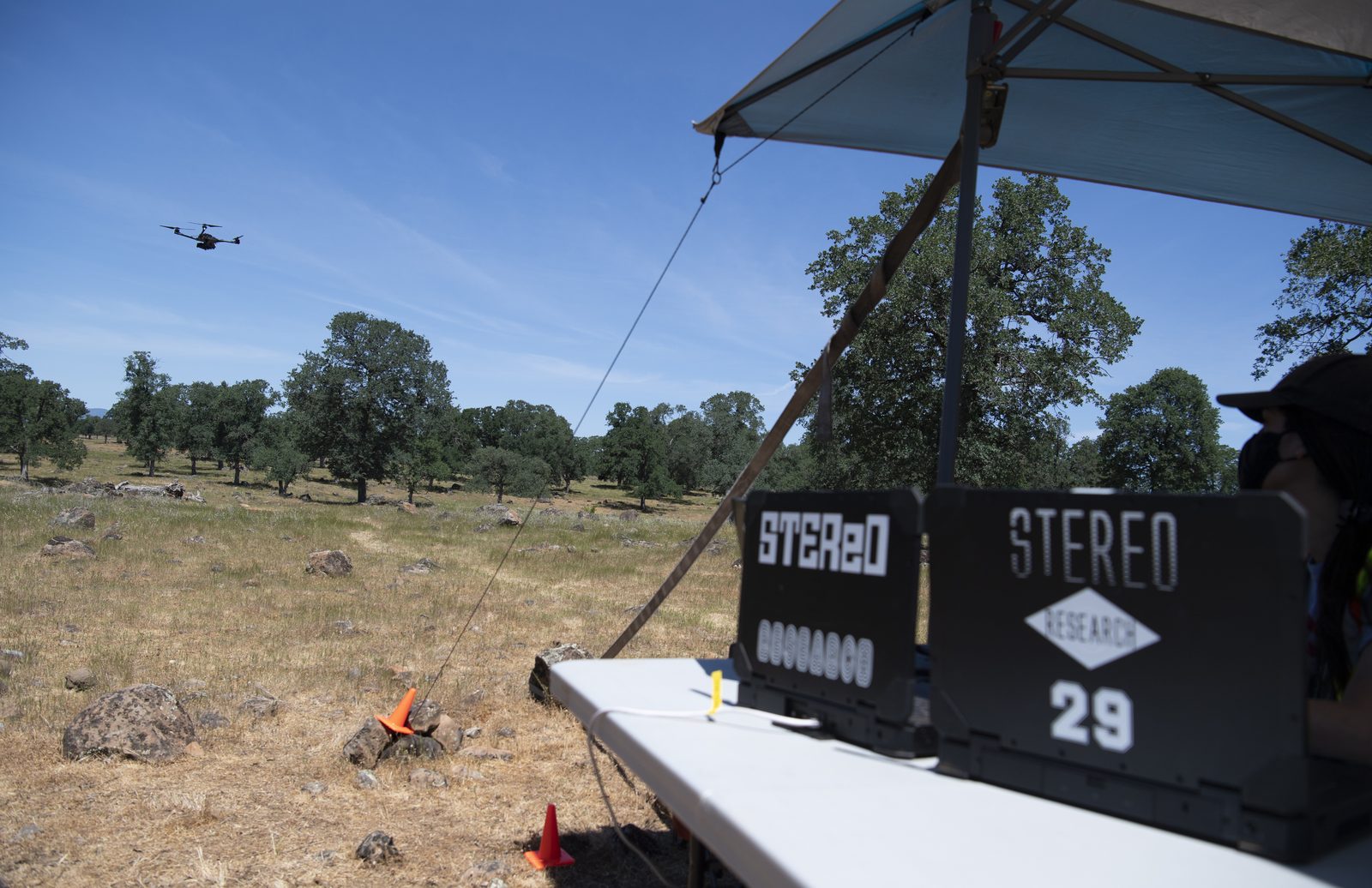 A FreeFly Alta X quadcopter drone hovers in the air during wildfire response flight tests near Redding, California. Real NASA photograph used on the Ellis Abel Learns "Why I Love Drones" page.